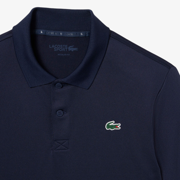 Polo Golf manches longues Ultra Dry Bleu Nuit...